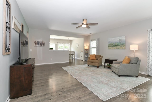 201 Fesperman Cir, Troutman, NC 28166 - living room featuring ceiling fan and dark wood finished floors