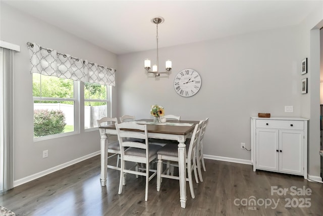 201 Fesperman Cir, Troutman, NC 28166 - dining space with dark wood-style flooring and a chandelier