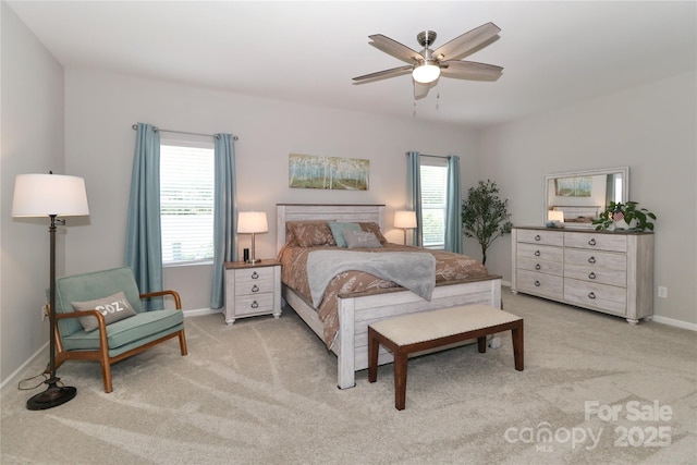201 Fesperman Cir, Troutman, NC 28166 - bedroom with carpet flooring, multiple windows, and a ceiling fan
