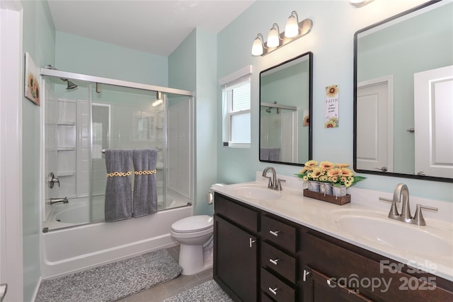 201 Fesperman Cir, Troutman, NC 28166 - full bath with double vanity, shower / bath combination with glass door, and tile patterned flooring