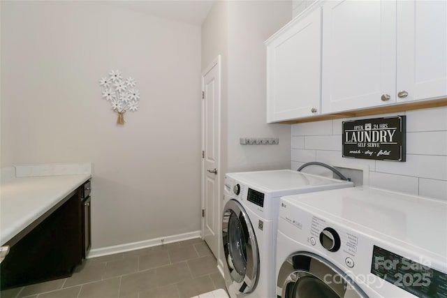 201 Fesperman Cir, Troutman, NC 28166 - laundry area with cabinet space, washing machine and dryer, and tile patterned flooring