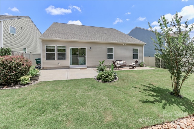 201 Fesperman Cir, Troutman, NC 28166 - back of property featuring a patio area, a fenced backyard, and outdoor lounge area