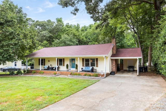 339 Deep Forest Ct, Gastonia, NC 28056 - single story home with a porch, a carport, a chimney, a front yard, and concrete driveway