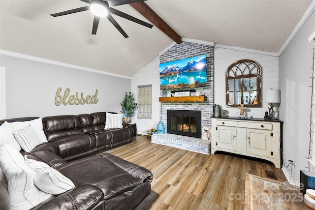 339 Deep Forest Ct, Gastonia, NC 28056 - living area featuring ceiling fan, wood finished floors, a fireplace, and ornamental molding