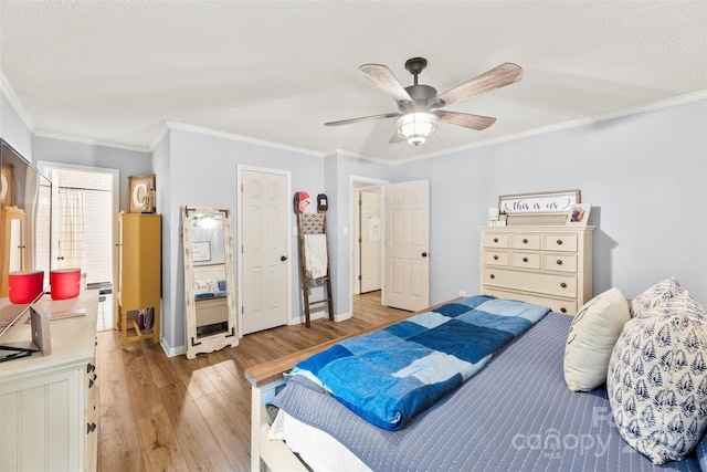 339 Deep Forest Ct, Gastonia, NC 28056 - bedroom with hardwood / wood-style flooring, ornamental molding, a textured ceiling, and ceiling fan
