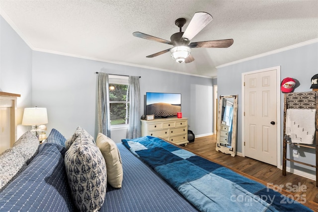 339 Deep Forest Ct, Gastonia, NC 28056 - bedroom featuring wood finished floors, a textured ceiling, crown molding, and ceiling fan