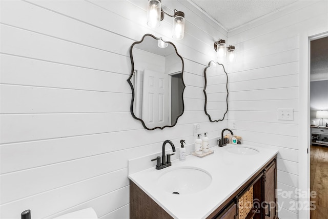 339 Deep Forest Ct, Gastonia, NC 28056 - bathroom featuring double vanity and a textured ceiling
