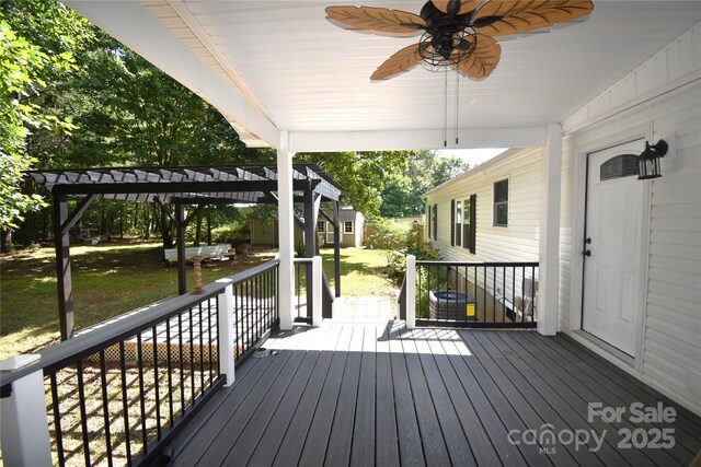 6264 Burnhurst Ln, Denver, NC 28037 - wooden terrace featuring a storage unit, a pergola, a ceiling fan, and a lawn