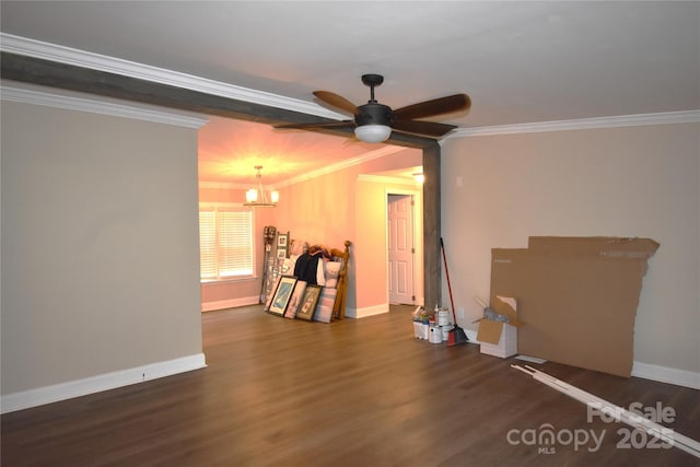 6264 Burnhurst Ln, Denver, NC 28037 - spare room featuring dark wood-style floors, ceiling fan, a chandelier, and ornamental molding