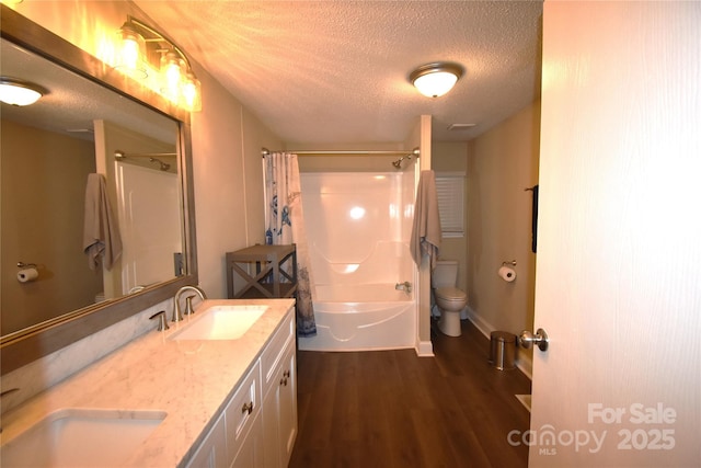 6264 Burnhurst Ln, Denver, NC 28037 - full bathroom with wood finished floors, shower / tub combo, double vanity, and a textured ceiling