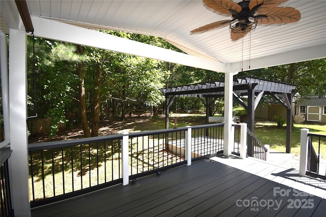 6264 Burnhurst Ln, Denver, NC 28037 - wooden deck with a pergola, ceiling fan, and an outbuilding