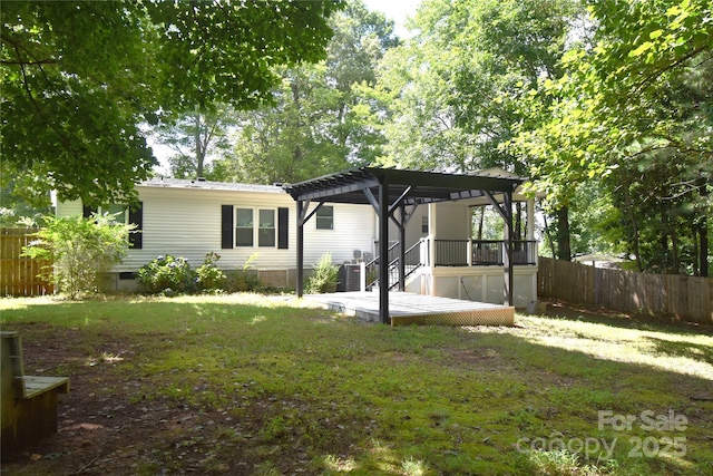6264 Burnhurst Ln, Denver, NC 28037 - back of property featuring crawl space and a wooden deck
