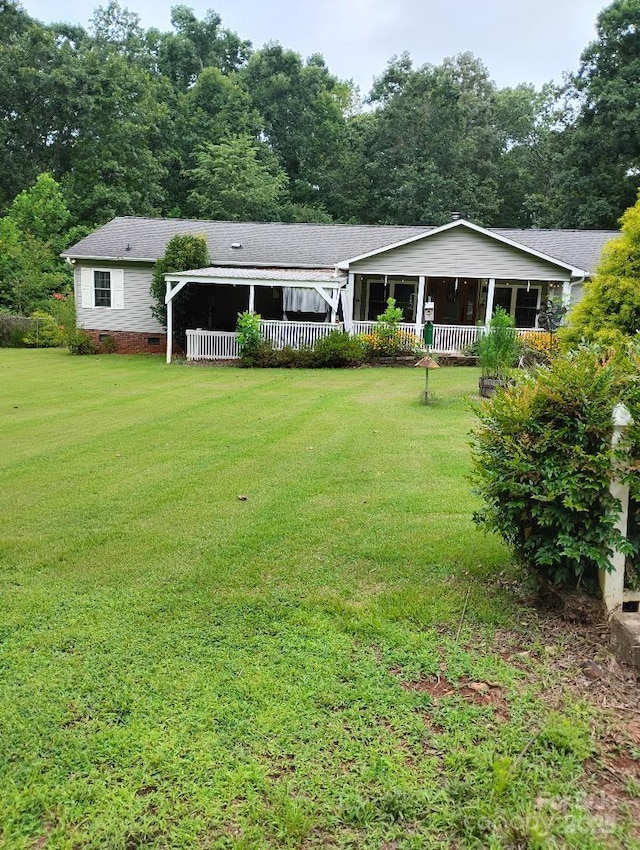 1824 Hephzibah Church Rd, Bessemer City, NC 28016 - view of front of property featuring crawl space, a front yard, a sunroom, and a shingled roof
