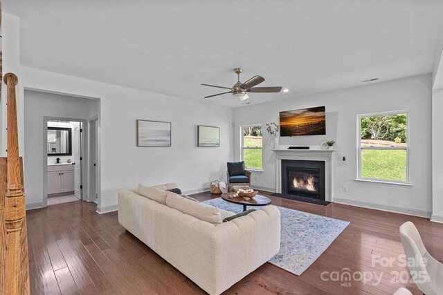 161 Oxford Dr, Mooresville, NC 28115 - living room with a ceiling fan, a fireplace with flush hearth, dark wood finished floors, and recessed lighting