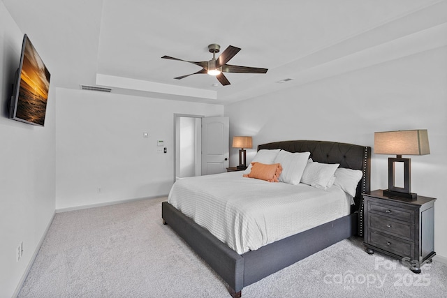 161 Oxford Dr, Mooresville, NC 28115 - bedroom with light carpet, ceiling fan, and a raised ceiling