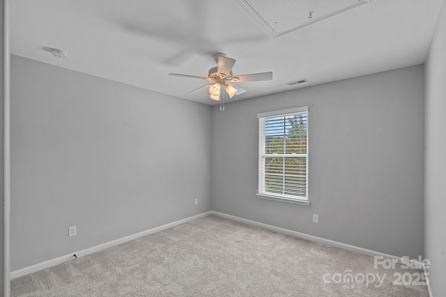 161 Oxford Dr, Mooresville, NC 28115 - carpeted empty room featuring attic access, a ceiling fan, and a smoke detector