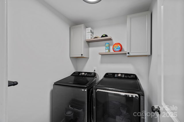 161 Oxford Dr, Mooresville, NC 28115 - washroom featuring washing machine and clothes dryer and cabinet space
