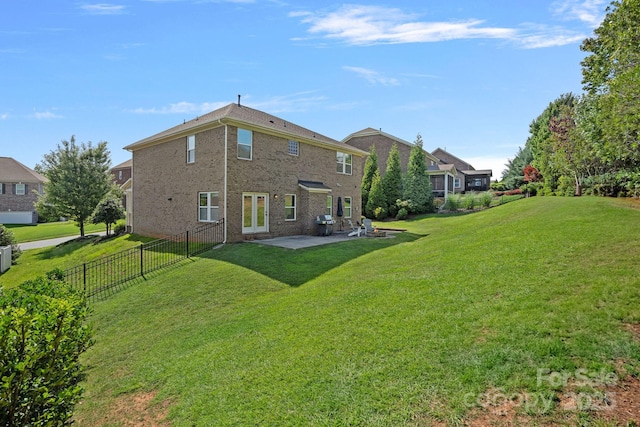 161 Oxford Dr, Mooresville, NC 28115 - back of property featuring a patio and brick siding