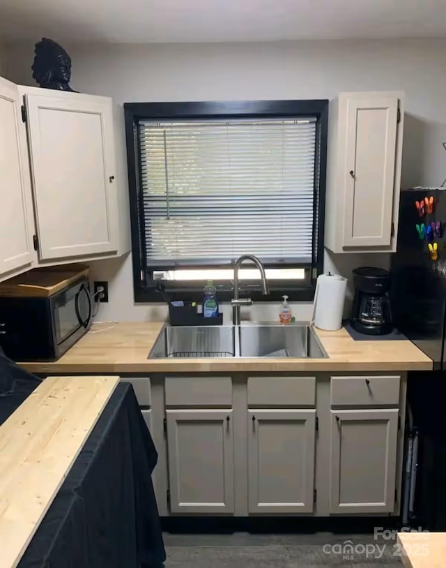 60 Walden Pond Rd, Bryson City, NC 28713 - kitchen with black appliances and butcher block counters