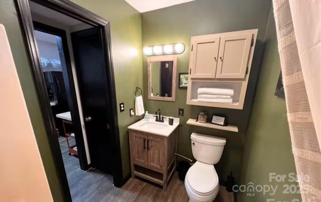 60 Walden Pond Rd, Bryson City, NC 28713 - bathroom with wood finished floors and vanity