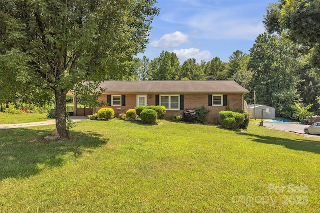 369 Birch Circle Dr, Hudson, NC 28638 - ranch-style home with a carport, brick siding, concrete driveway, and a front lawn