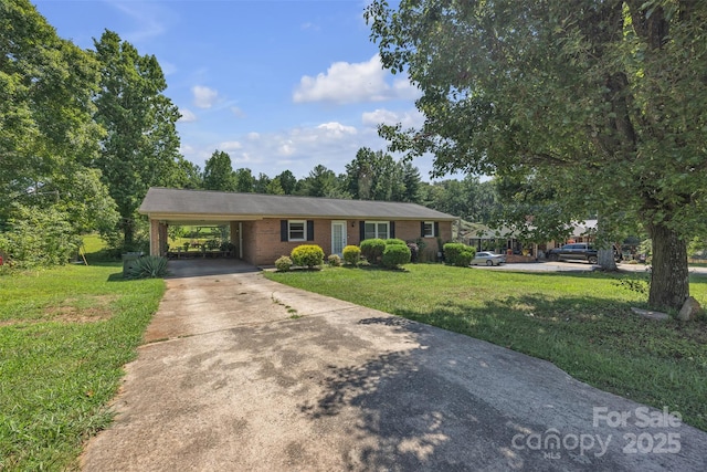 369 Birch Circle Dr, Hudson, NC 28638 - ranch-style house with concrete driveway, a front yard, an attached carport, and brick siding