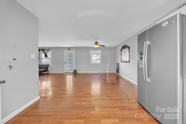 369 Birch Circle Dr, Hudson, NC 28638 - unfurnished living room featuring light wood-style floors and ceiling fan