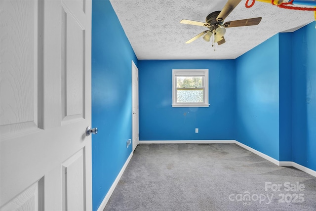369 Birch Circle Dr, Hudson, NC 28638 - carpeted spare room featuring a ceiling fan and a textured ceiling