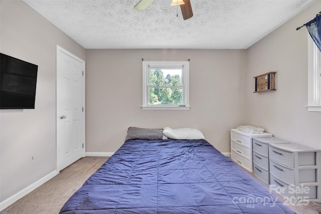 369 Birch Circle Dr, Hudson, NC 28638 - carpeted bedroom with ceiling fan and a textured ceiling