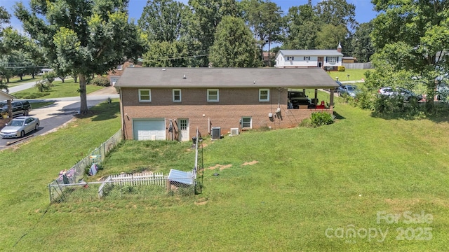 369 Birch Circle Dr, Hudson, NC 28638 - back of house with an attached garage and brick siding