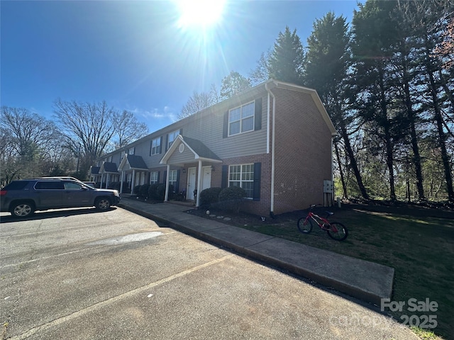 972 NW 8th Ave, Hickory, NC 28601 - view of front of property with brick siding and uncovered parking