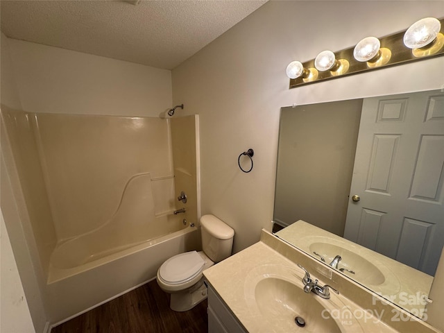 972 NW 8th Ave, Hickory, NC 28601 - full bathroom featuring a textured ceiling, wood finished floors,  shower combination, and vanity