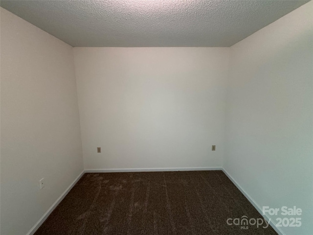 972 NW 8th Ave, Hickory, NC 28601 - carpeted empty room featuring baseboards and a textured ceiling