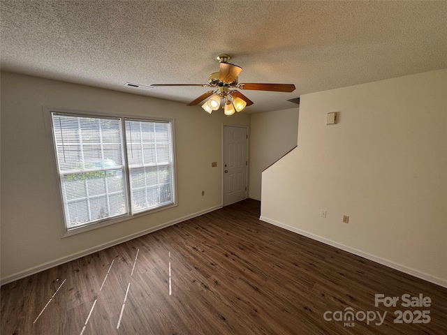 972 NW 8th Ave, Hickory, NC 28601 - empty room featuring dark wood-style floors, ceiling fan, and a textured ceiling