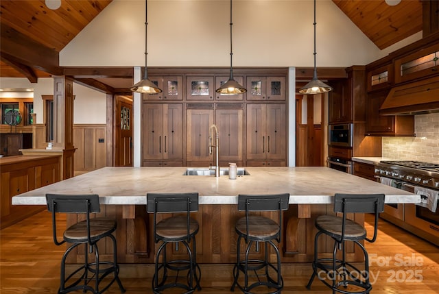 14 Clear Fork Ln, Fairview, NC 28730 - kitchen featuring wooden ceiling, appliances with stainless steel finishes, wainscoting, wood finished floors, and high vaulted ceiling