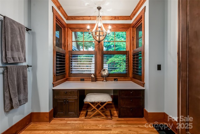 14 Clear Fork Ln, Fairview, NC 28730 - office space featuring a chandelier, built in study area, light wood-style floors, and crown molding