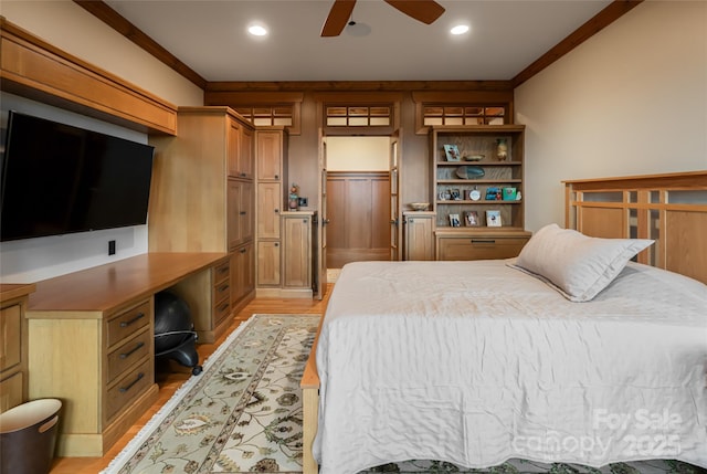 14 Clear Fork Ln, Fairview, NC 28730 - bedroom with light wood-style floors, crown molding, built in desk, and recessed lighting