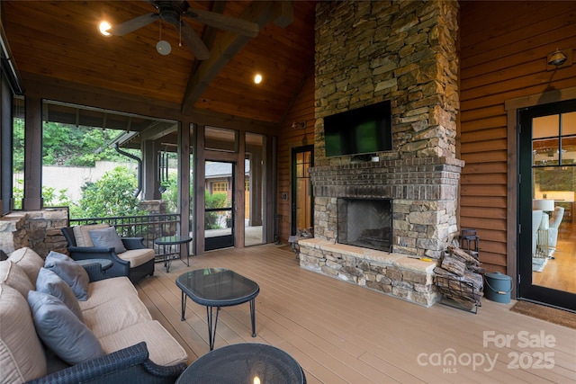 14 Clear Fork Ln, Fairview, NC 28730 - living room with high vaulted ceiling, a wooden ceiling with exposed beams, ceiling fan, an outdoor stone fireplace, and hardwood / wood-style floors