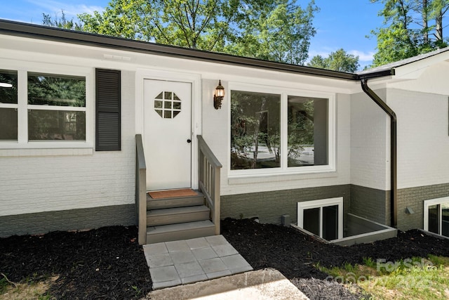 6672 Brevard Rd, Etowah, NC 28729 - view of exterior entry with brick siding