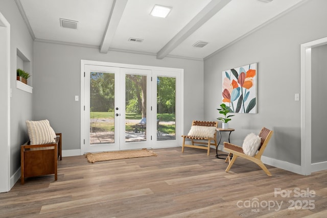 6672 Brevard Rd, Etowah, NC 28729 - living area with french doors, beam ceiling, and wood finished floors