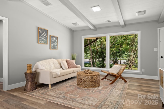 6672 Brevard Rd, Etowah, NC 28729 - living room featuring beamed ceiling and wood finished floors