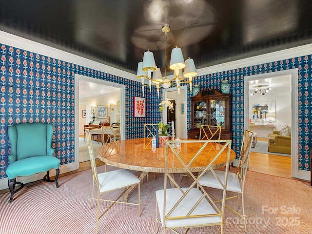 2912 Wheelock Rd, Charlotte, NC 28211 - dining space featuring wallpapered walls, ornamental molding, and a chandelier