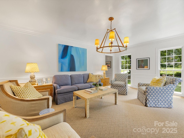 2912 Wheelock Rd, Charlotte, NC 28211 - living room featuring ornamental molding, a chandelier, carpet flooring, a decorative wall, and a wainscoted wall