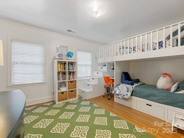 2912 Wheelock Rd, Charlotte, NC 28211 - bedroom featuring wood finished floors and crown molding