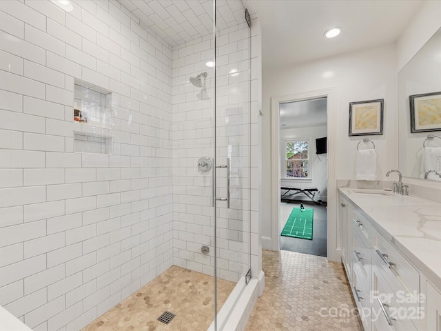 2912 Wheelock Rd, Charlotte, NC 28211 - ensuite bathroom with a stall shower, double vanity, recessed lighting, and tile patterned flooring