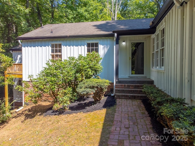 197 Briar Patch Rd, Cullowhee, NC 28723 - property entrance featuring roof with shingles and board and batten siding