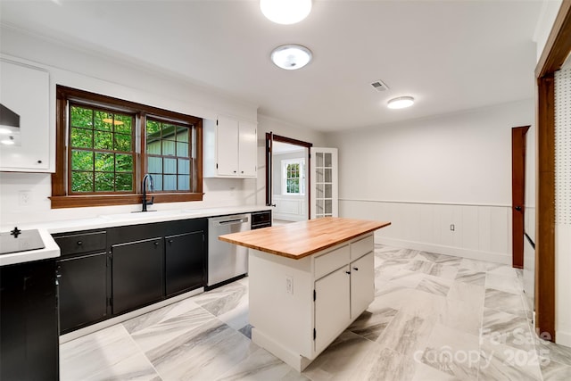 197 Briar Patch Rd, Cullowhee, NC 28723 - kitchen with dark cabinetry, wood counters, white cabinets, a kitchen island, and stainless steel dishwasher