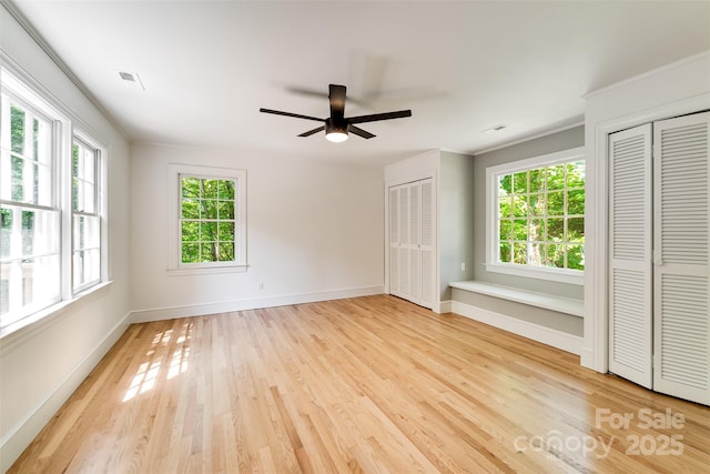 197 Briar Patch Rd, Cullowhee, NC 28723 - spare room with healthy amount of natural light, light wood finished floors, and ceiling fan