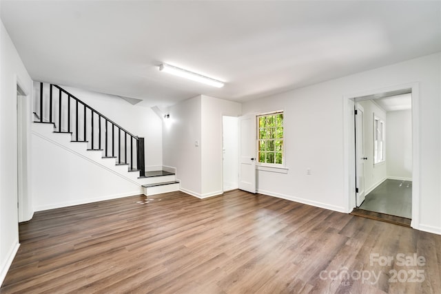 197 Briar Patch Rd, Cullowhee, NC 28723 - foyer with wood finished floors and stairs