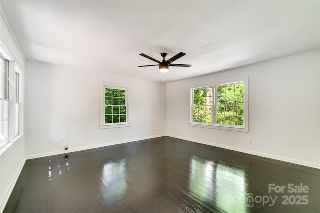 197 Briar Patch Rd, Cullowhee, NC 28723 - empty room featuring plenty of natural light, ceiling fan, and dark wood-style flooring